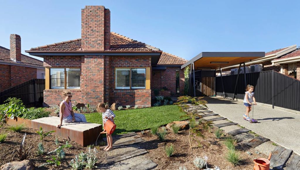 From the outside, this seems a typical family brick-and-tile bungalow, but it's not so predictable at the rear.  Photo: Tatjana Plitt