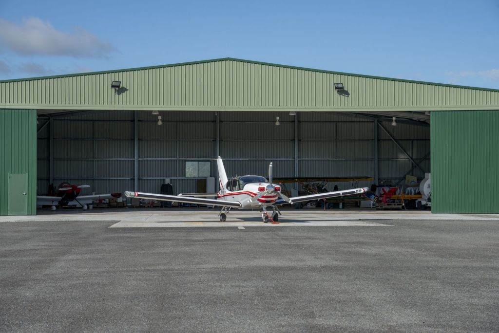 Park your plane in the spacious aircraft hangar.