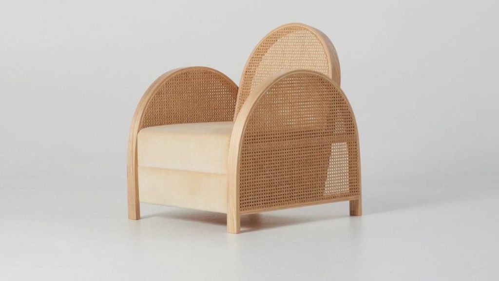 Wood and rattan are mixed in the deco-inspired Arch chair from designers Douglas and Bec.