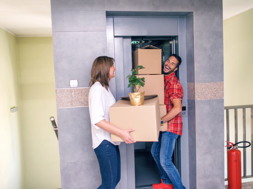 People moving into an apartment can commonly result in lifts being stuck. Photo: iStock Photo: iStock