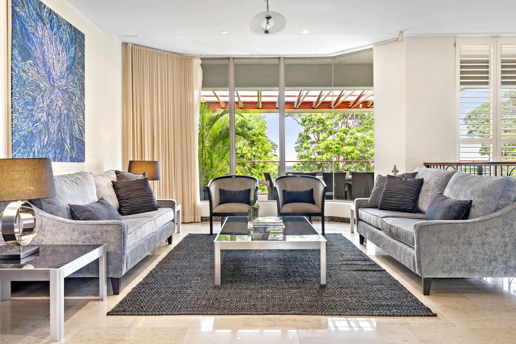 The living room is sprawled across the entire mid-level. Photo: Supplied