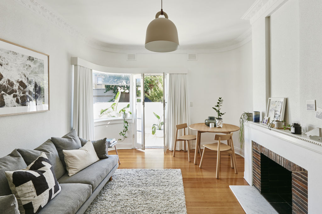 The colour of the floorboards and amount of natural light in your home will affect the look of the white paint on your walls. Lucy Glade-Wright's Armadale apartment. Photo: Nikole Ramsay