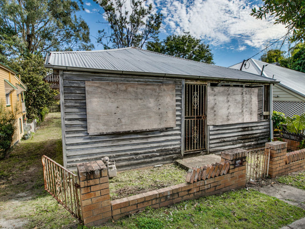 50 Deighton Street, Dutton Park was boarded up and deemed unsafe to enter but Rina Zlatkin bought it anyway. Photo: Ray White Stones Corner