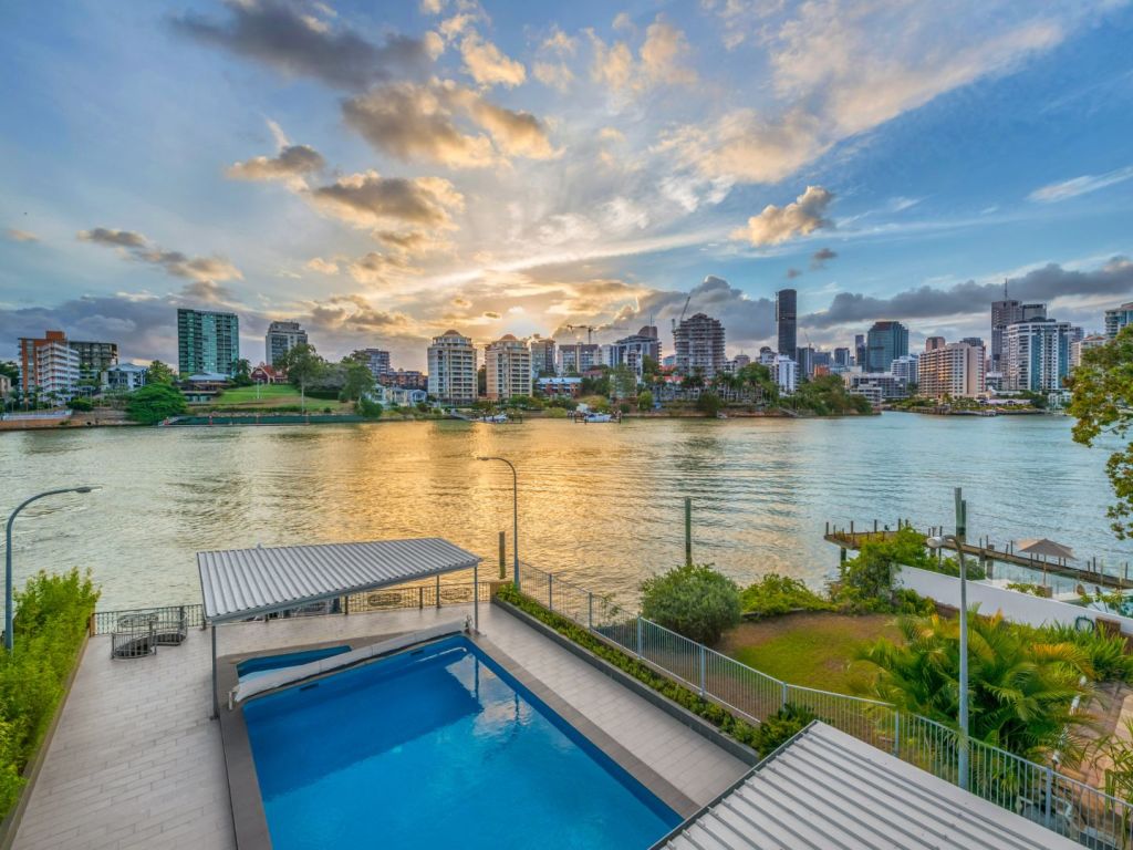 The property features rare uninterrupted access to the Brisbane river.