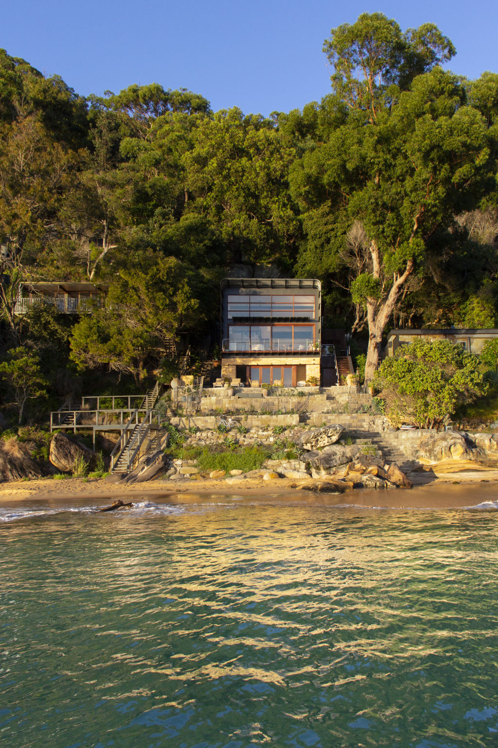 The off-grid shack is built into a steep bit of land. Photo: Rhys Holland