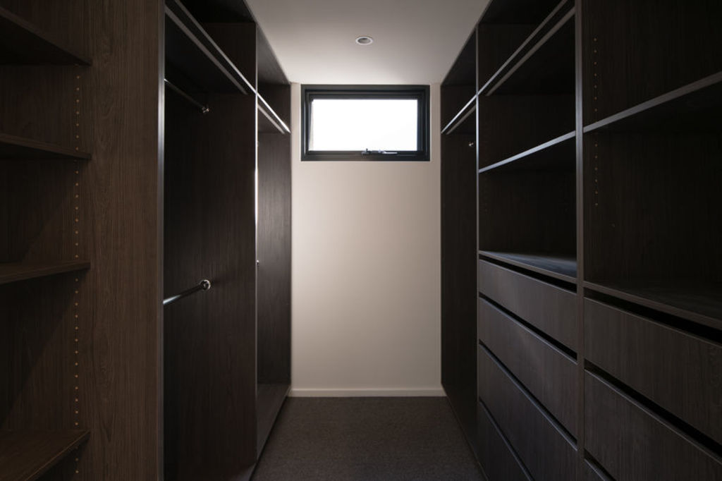 The more storage space, the more things you'll feel compelled to buy to fill them. Photo: Stocksy
