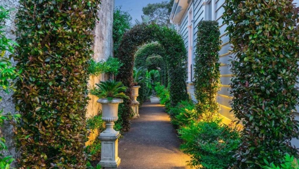 Landscaped arches frame the walkway down the side of the building. Photo: Ray White