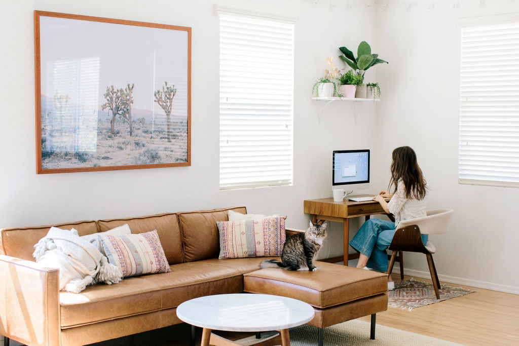 Working remotely instead of working in a typical office means that you can create your very own office sanctuary at home.  Photo: Stocksy