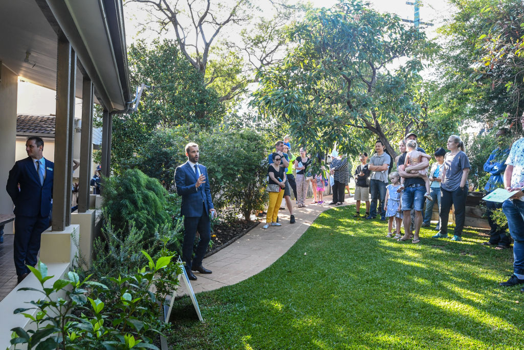 About 30 people turned out for the auction of the five-bedroom house with a granny flat.  Photo: Peter Rae