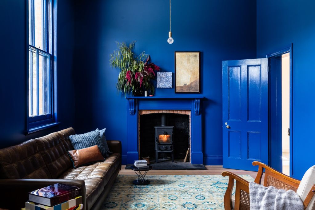 The home's French blue living room. Photo: Trevor Mein