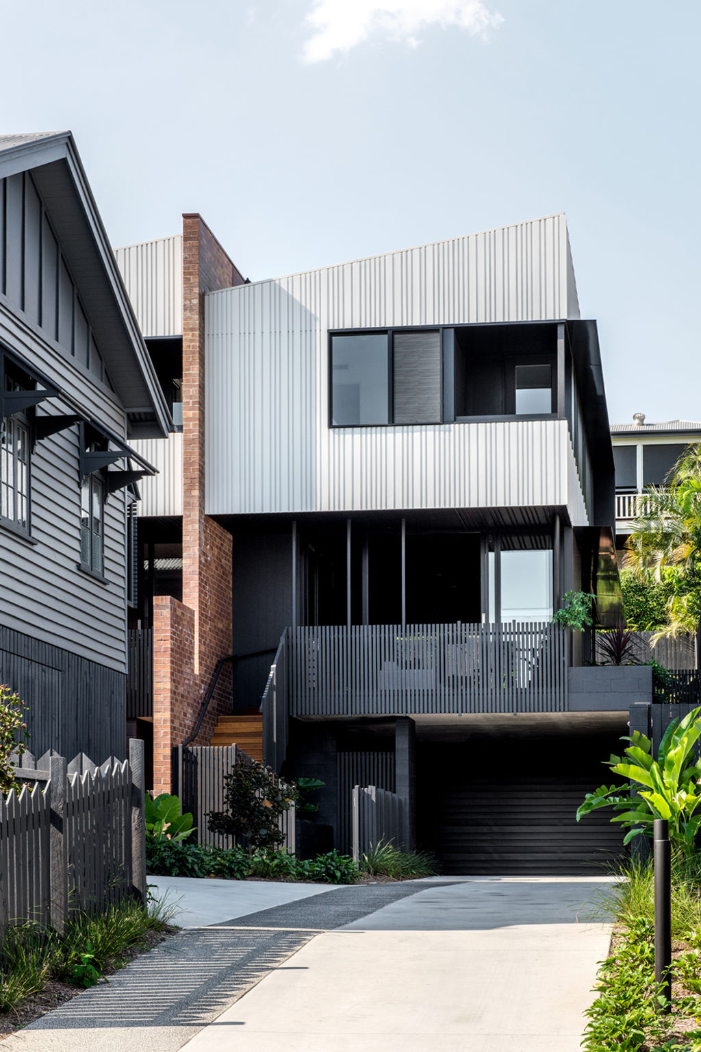 The architect shifted the old house on the block slightly to make space for the Longfellow Terraces. Photo: Cathy Schusler