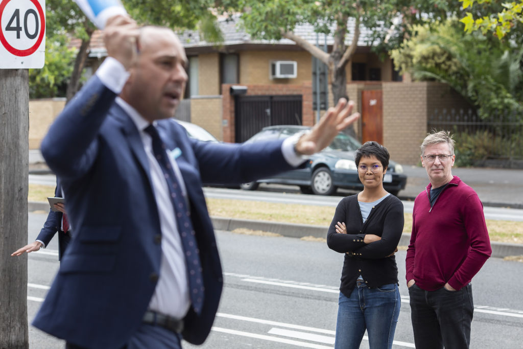 Warwick Gardiner in the foreground with the buyers standing to his right.  Photo: Stephen McKenzie