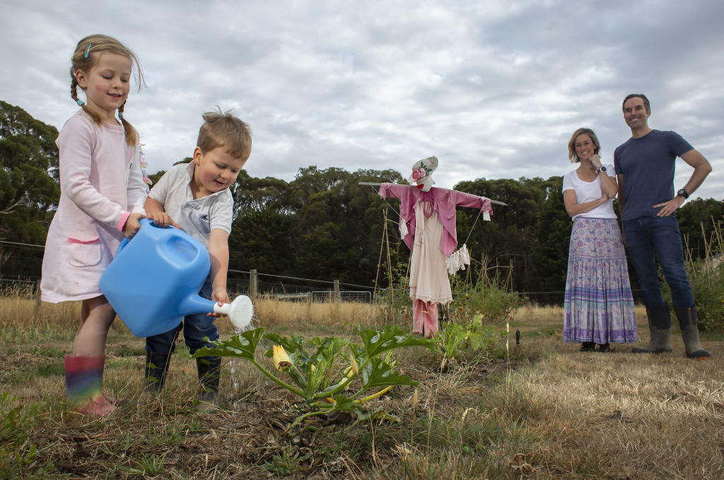 Harriet and Jack help out in the garden.  Photo: Stephen McKenzie