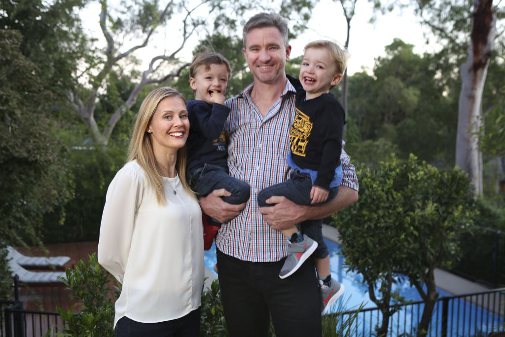 Janine and Patrick Walker with their twin sons Aiden (left) and Lachlan (right) at their upper north shore home. Photo: James Alcock