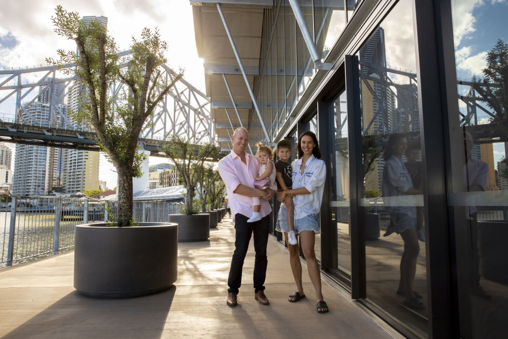 Lance Burrows is general manager at Brisbane's hottest new development, Howard Smith Wharves, while Kristi works two days a week and says she enjoys the slower pace of life and less congestion. Photo: Tammy Law