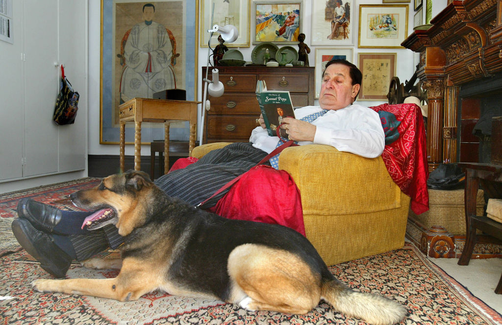 The late honourable Roddy Meagher, pictured at his Darling Point home with his dog Didee. Photo: Robert Pearce