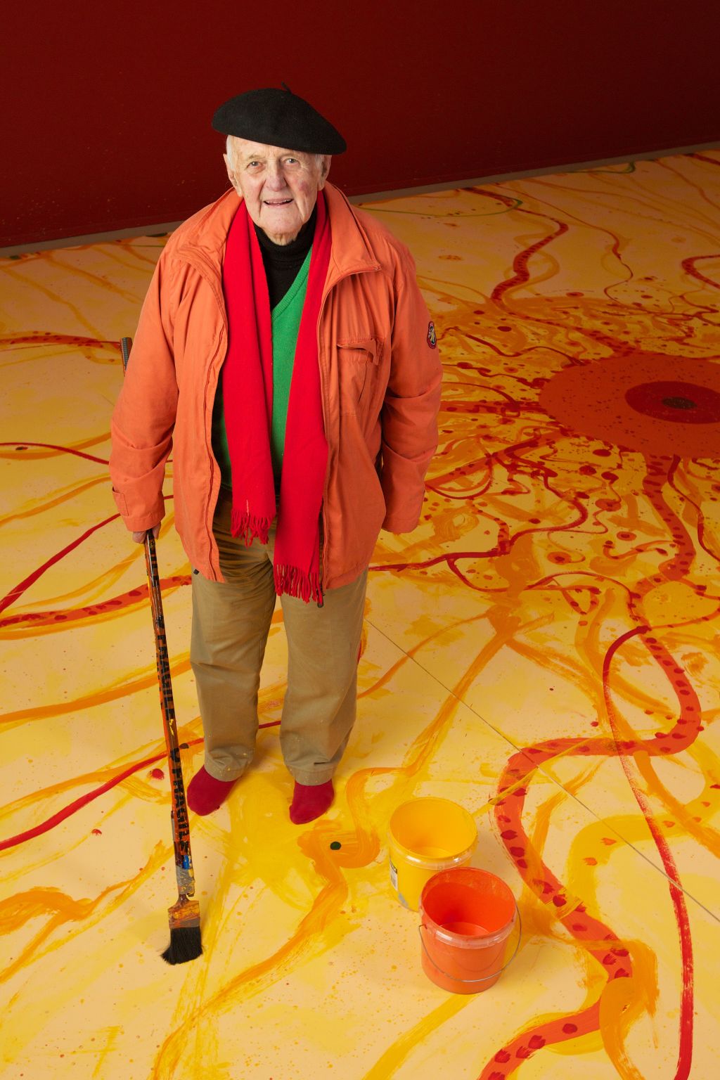 Artist John Olsen stands with his artwork The King Sun at the Robertson studio.  Photo: Wolter Peeters
