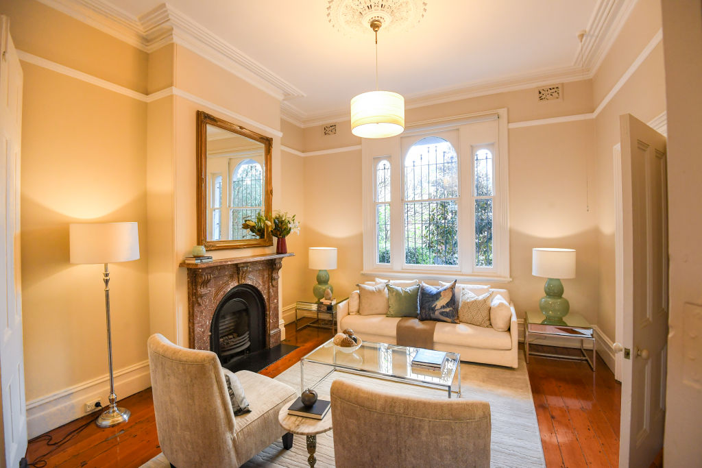 The living room of the three-bedroom Victorian terrace at 126 Hereford Street, Forest Lodge. Photo: Peter Rae