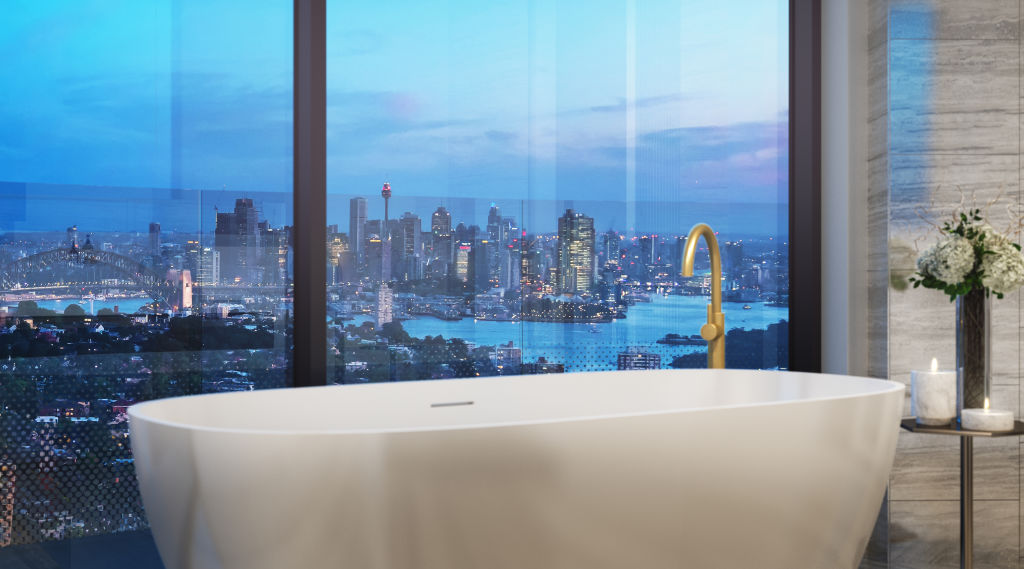 A sculptural bathtub near one of the apartment's floor-to-ceiling windows. Photo: Supplied