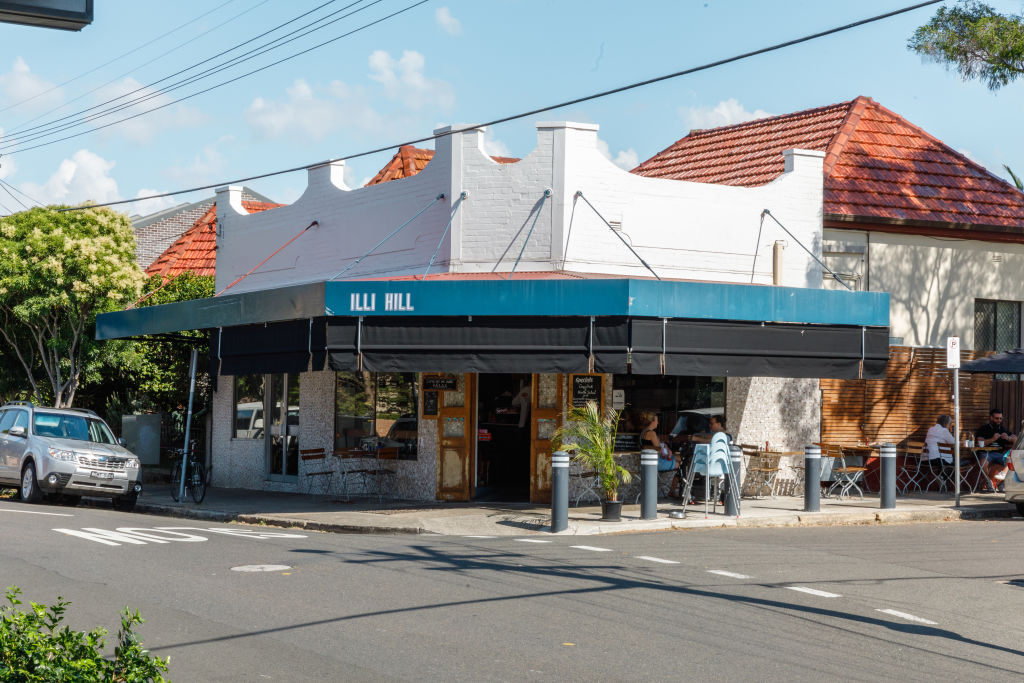 Outside Illi Hill Cafe in Marrickville, a suburb that has changed dramatically over the past decade. Photo: Steven Woodburn