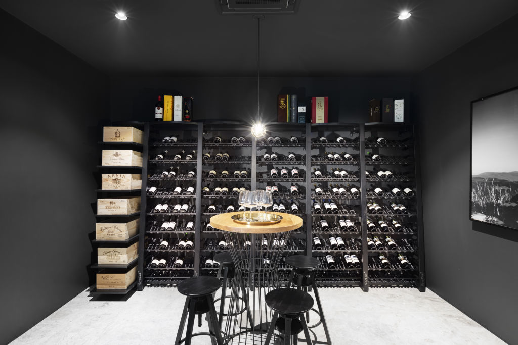 There’s space for six cars to fit easily in the subterranean garage, as well as a gym, powder room and a temperature-controlled glass-door wine room. Photo: Marshall White