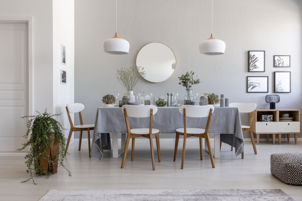 The dining room is the best place in the home to hang a mirror according to feng shui. Photo: iStock