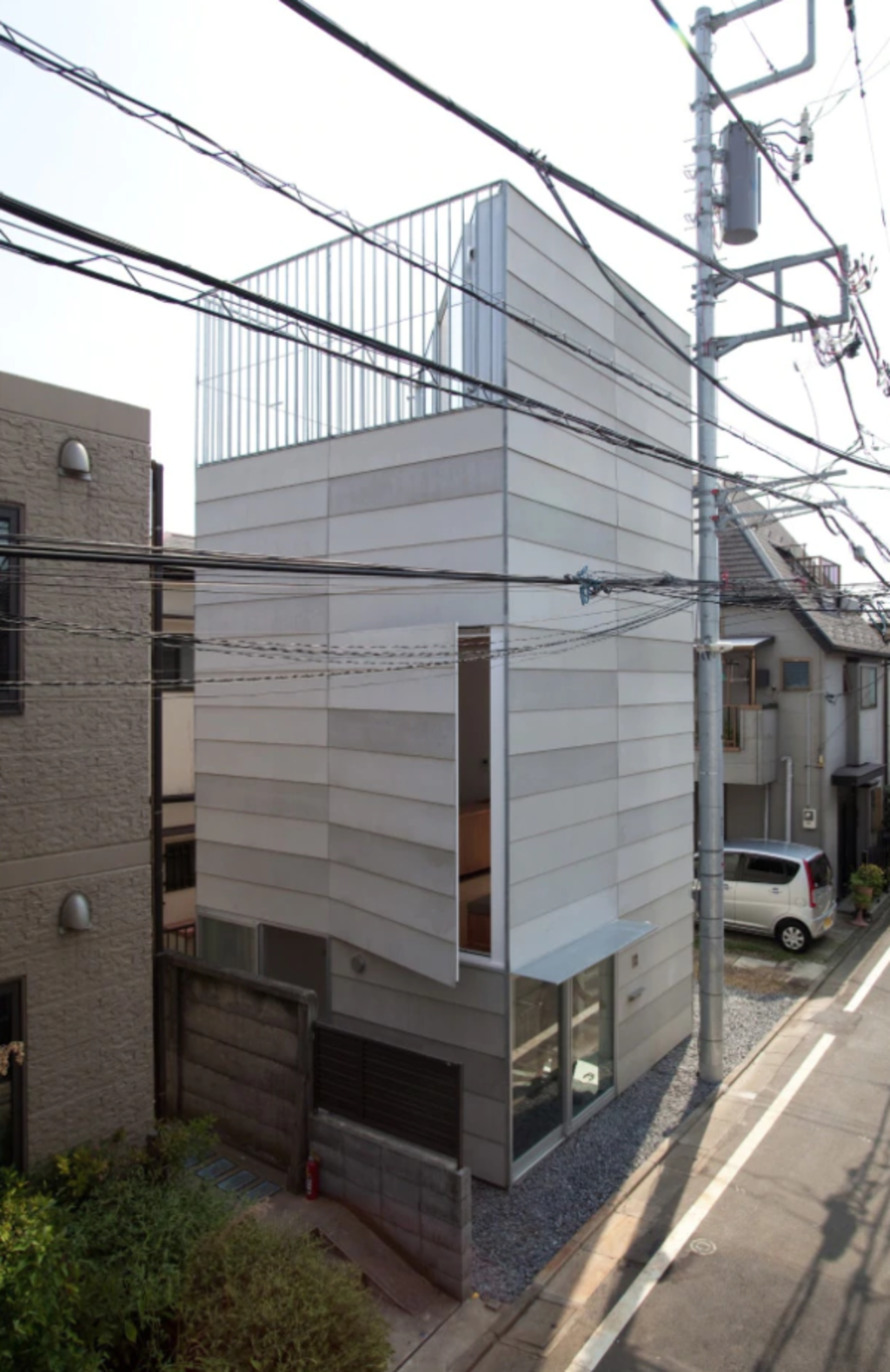 The house has a basement and four stories, with a roof terrace. Photo: Ken Sasajima