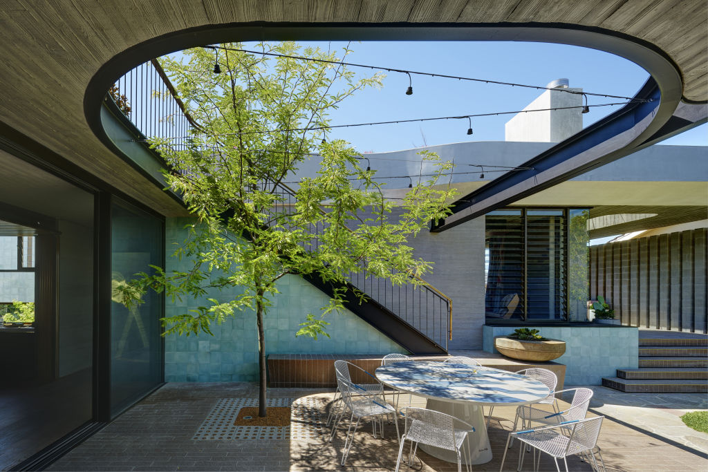 This pocket courtyard pays homage to Floreat's history as a garden suburb. Photo: Michael Nicholson