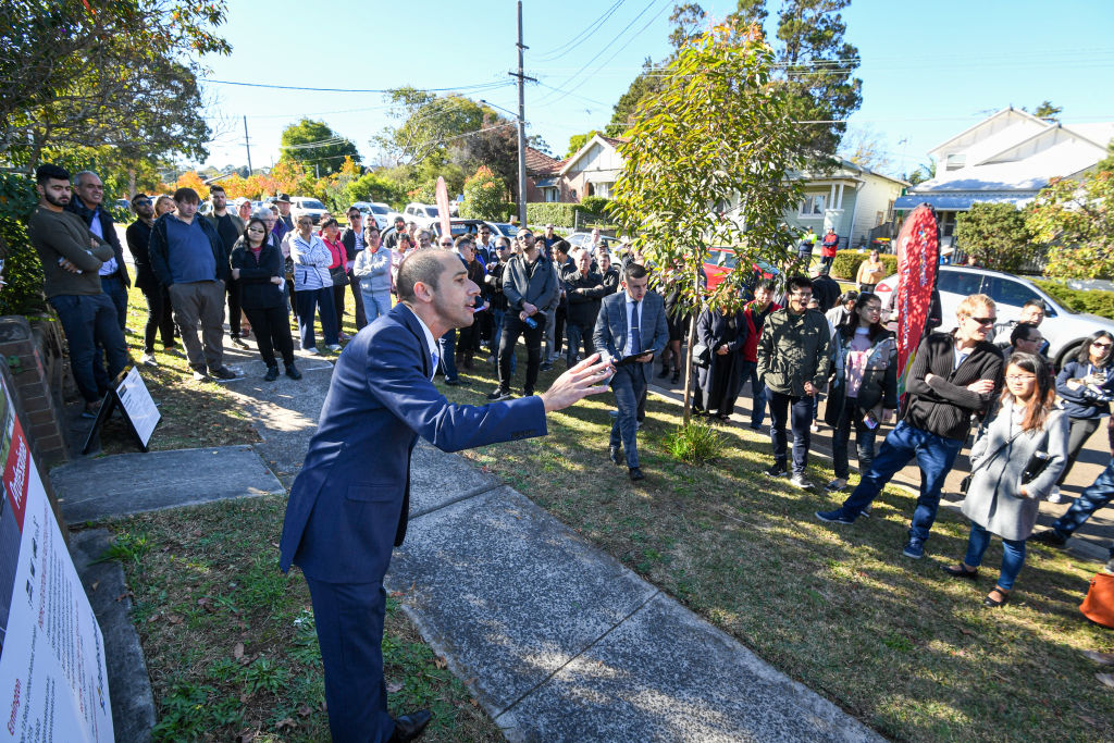 Auctioneer Rocky Bartolotto at 15 Linton Avenue, West Ryde. Photo: Peter Rae