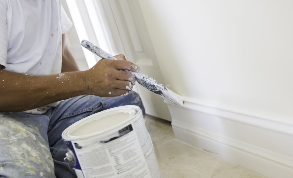 Painting after purchase but before tenants move in is considered capital works and can't be deducted straight way. Painting between tenancies can be considered repairs and can be deducted in that financial year. Photo: iStock