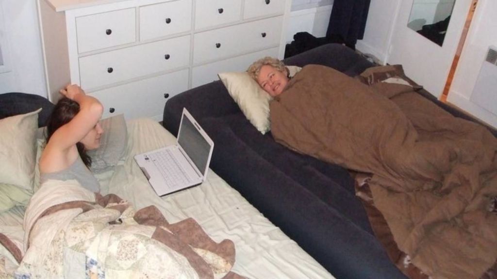 On rare occasions, we had overnight guests. Here my mother-in-law lies on an inflatable mattress next to the folded out click-clack; the two together took up all of the available floor space. Photo: Emily Brookes