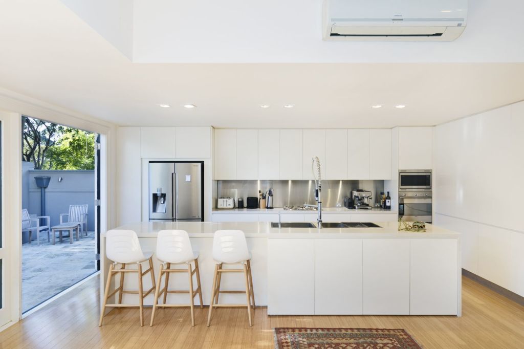 The kitchen opens out onto a courtyard.