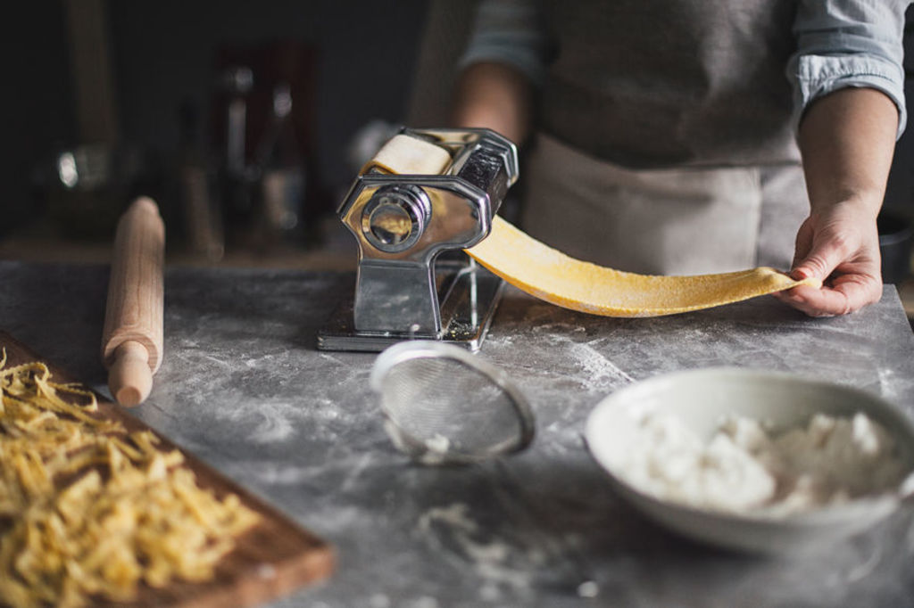 Basic pasta making requires flour, egg, a rolling pin, smooth-edged knife and work surface.  Photo: Stocksy