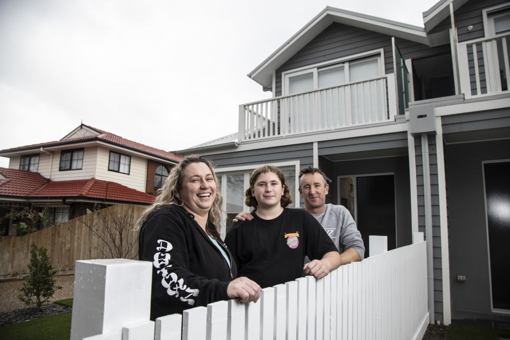 Kendra and Michael McKindley with son Laukynn at their Williamstown rental property. Photo: Leigh Henningham