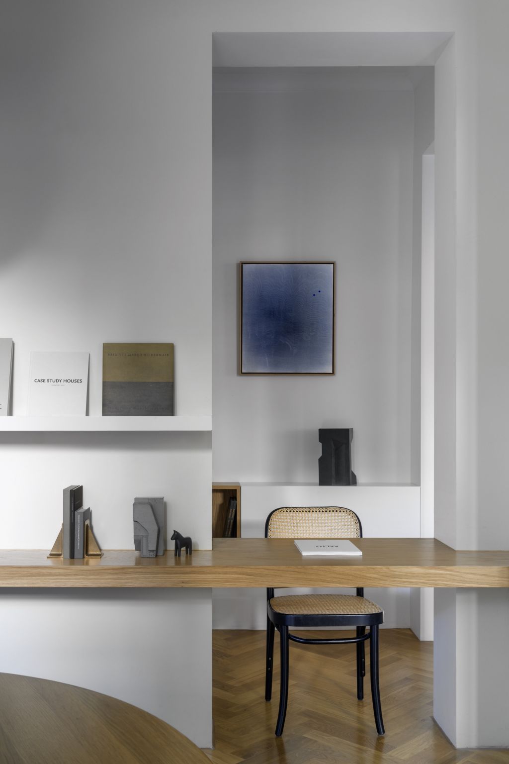 In place of a door to the lost bedroom is a multipurpose desk. Photo: Justin Alexander