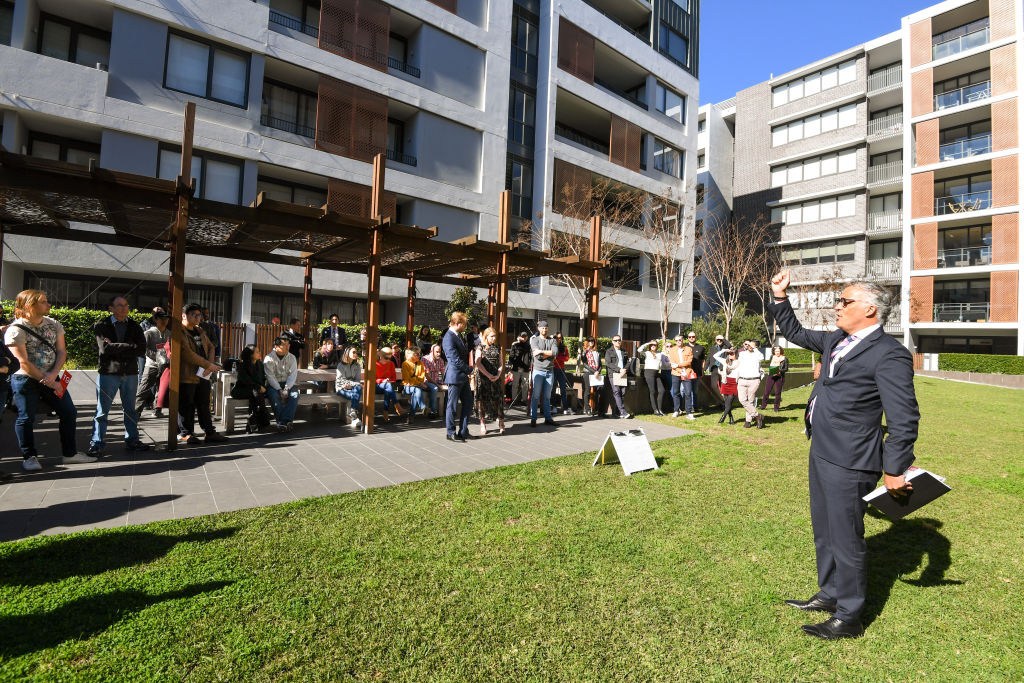 The crowd that gathered for the auction of apartment 410/1 Pearl Street, Erskineville. Photo: Peter Rae
