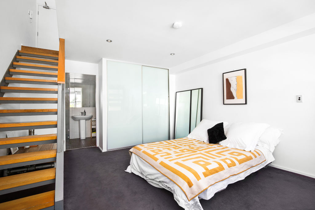 The loft-style Bondi Beach apartment’s downstairs bedroom. Photo: Supplied