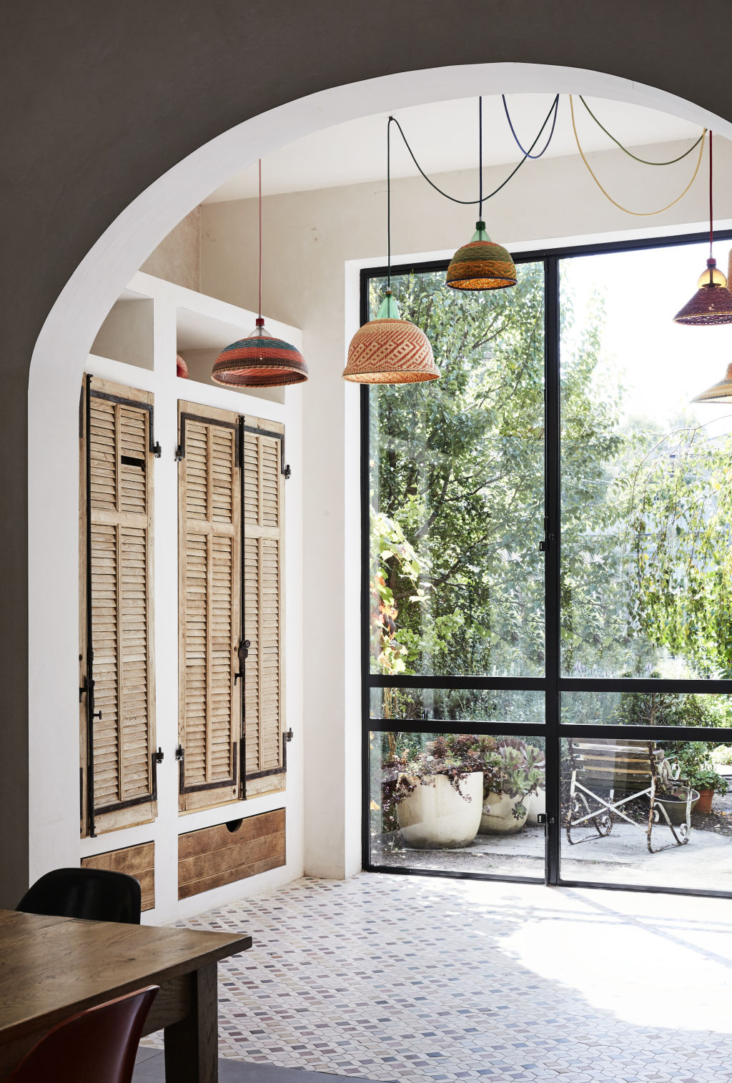 Incredible PET Lamp woven lampshades (using recycled plastic bottles) from Safari Living. Wooden shutters from Manon bis. Styling: Annie Portelli. Photo: Caitlin Mills