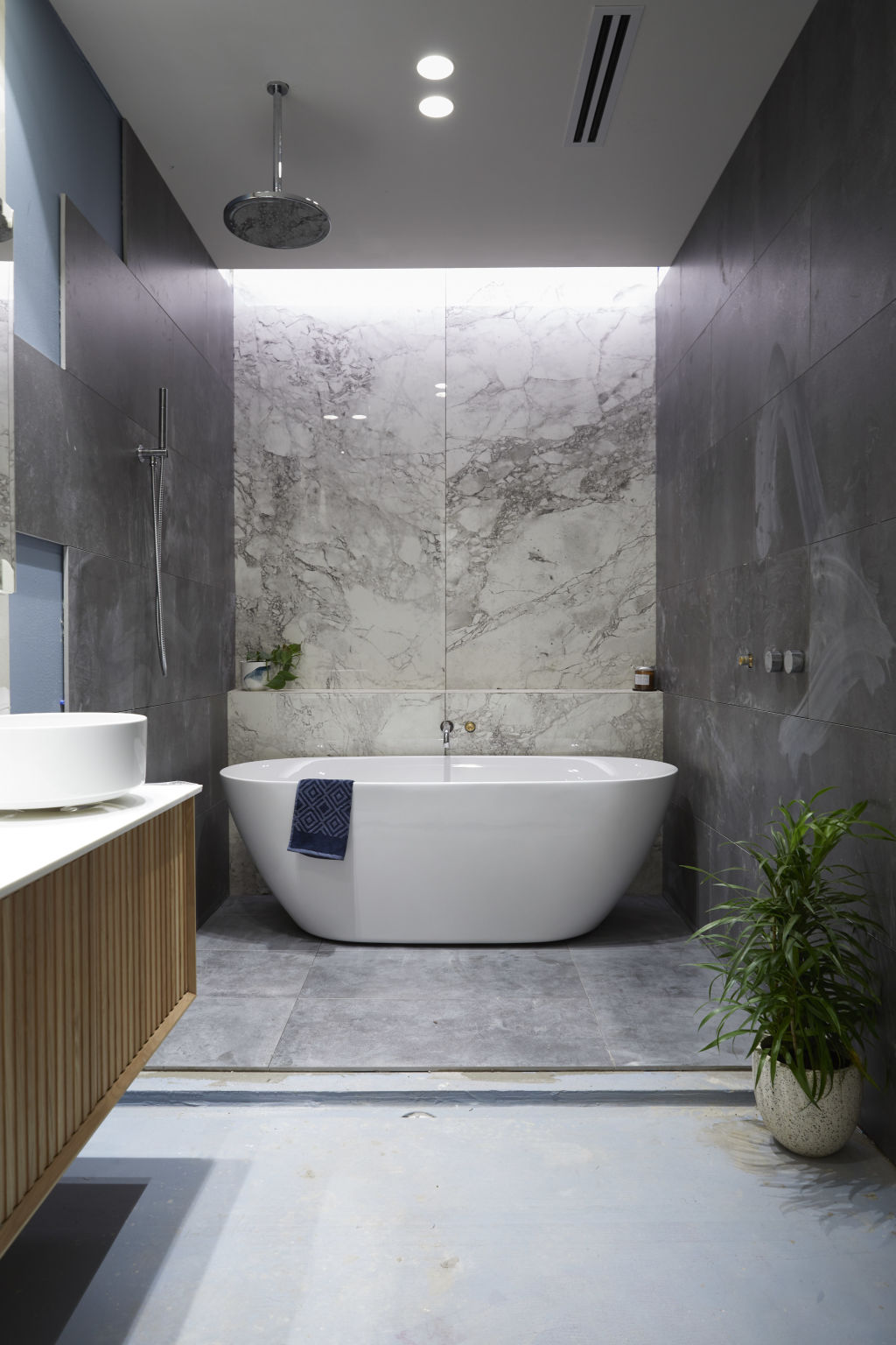 Grey bathrooms like Jesse and Mel's 'sell houses that were renovated 10 years ago'. Photo: Channel Nine