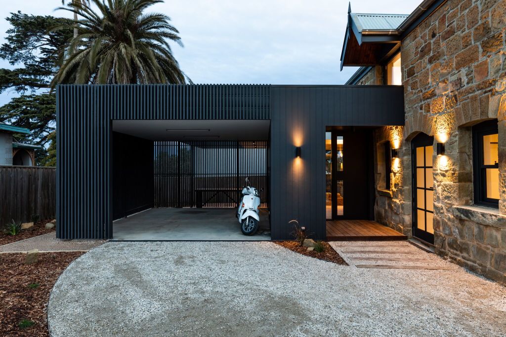This historic coach house has been transformed into a modern home. Photo: Adam Gibson