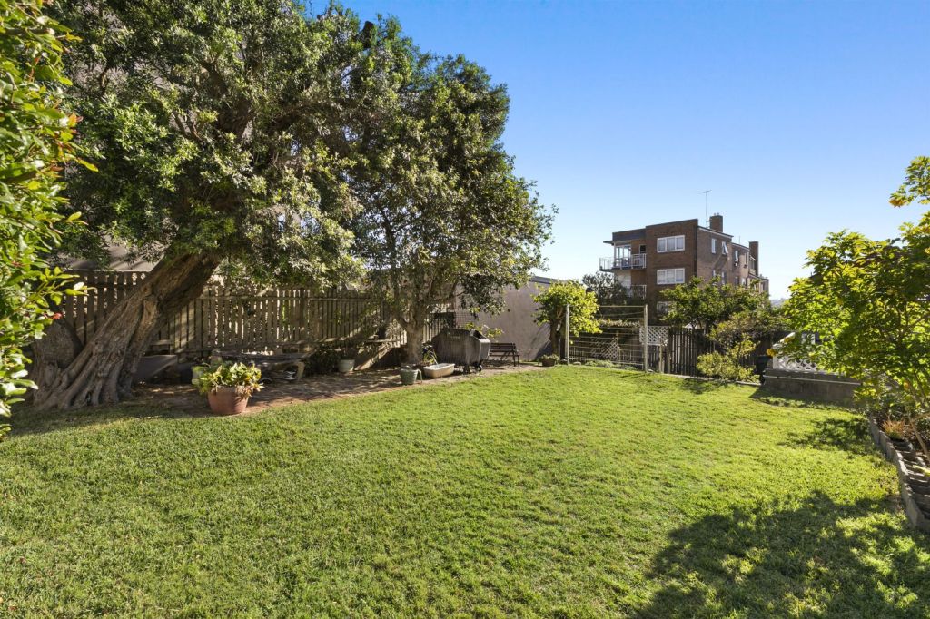 The home was accompanied by an expansive backyard.