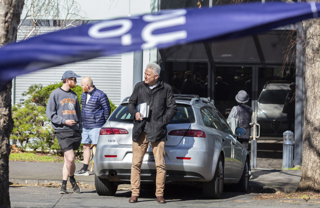 Peter Fox (centre of frame) while bidding.  Photo: Stephen McKenzie