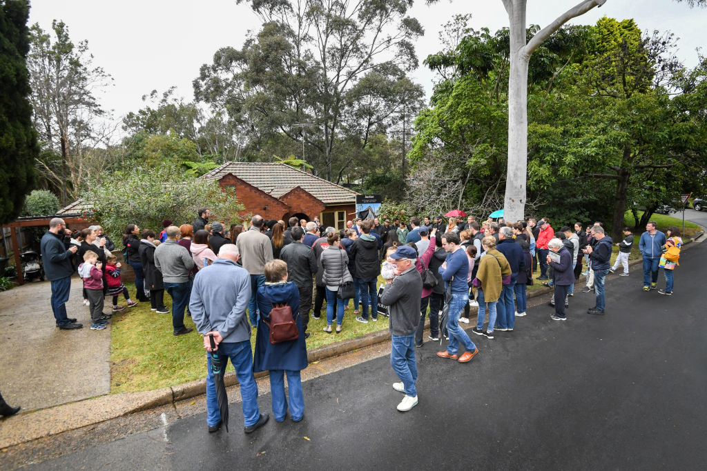 The auction crowd for the deceased estate at 32 Gamma Rd, Lane Cove. Photo: Peter Rae