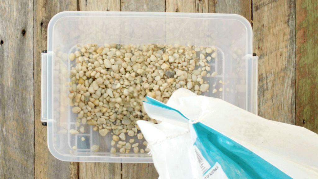 Create the reservoir by filling the plastic box with gravel and lining with geotextile fabric. Photo: Stephen Claxton