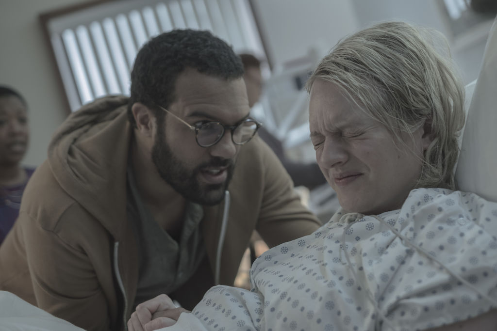 THE HANDMAID'S TALE -- "Holly" -- Episode 211 -- Offred faces a grueling challenge alone as she recalls her life as a mother. Serena Joy and the Commander deal with the fallout of their actions towards Offred. Luke (O-T Fagbenle) and Offred (Elisabeth Moss), shown. Photo: George Kraychyk/Hulu