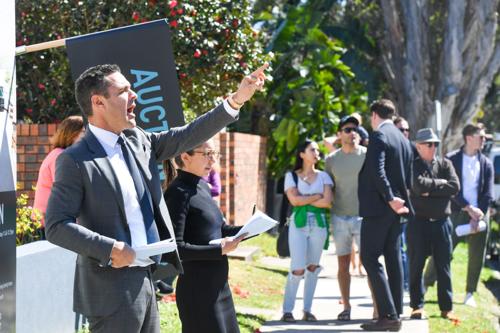 House hunters out in force for rapid-fire auction of $2.4 million Bondi semi