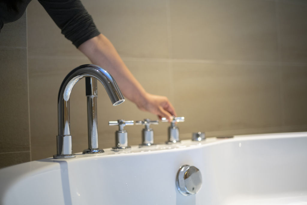 Turn on all taps to check water pressure and ensure there are no blockages. Photo: iStock