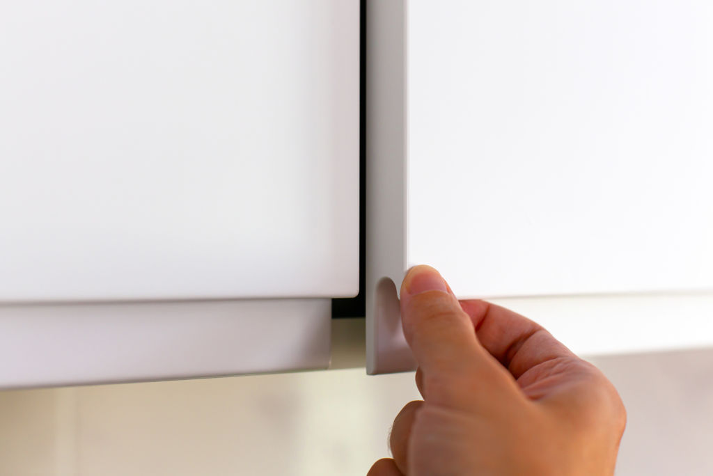 Check cupboard mechanisms and ensure doors align. Photo: iStock
