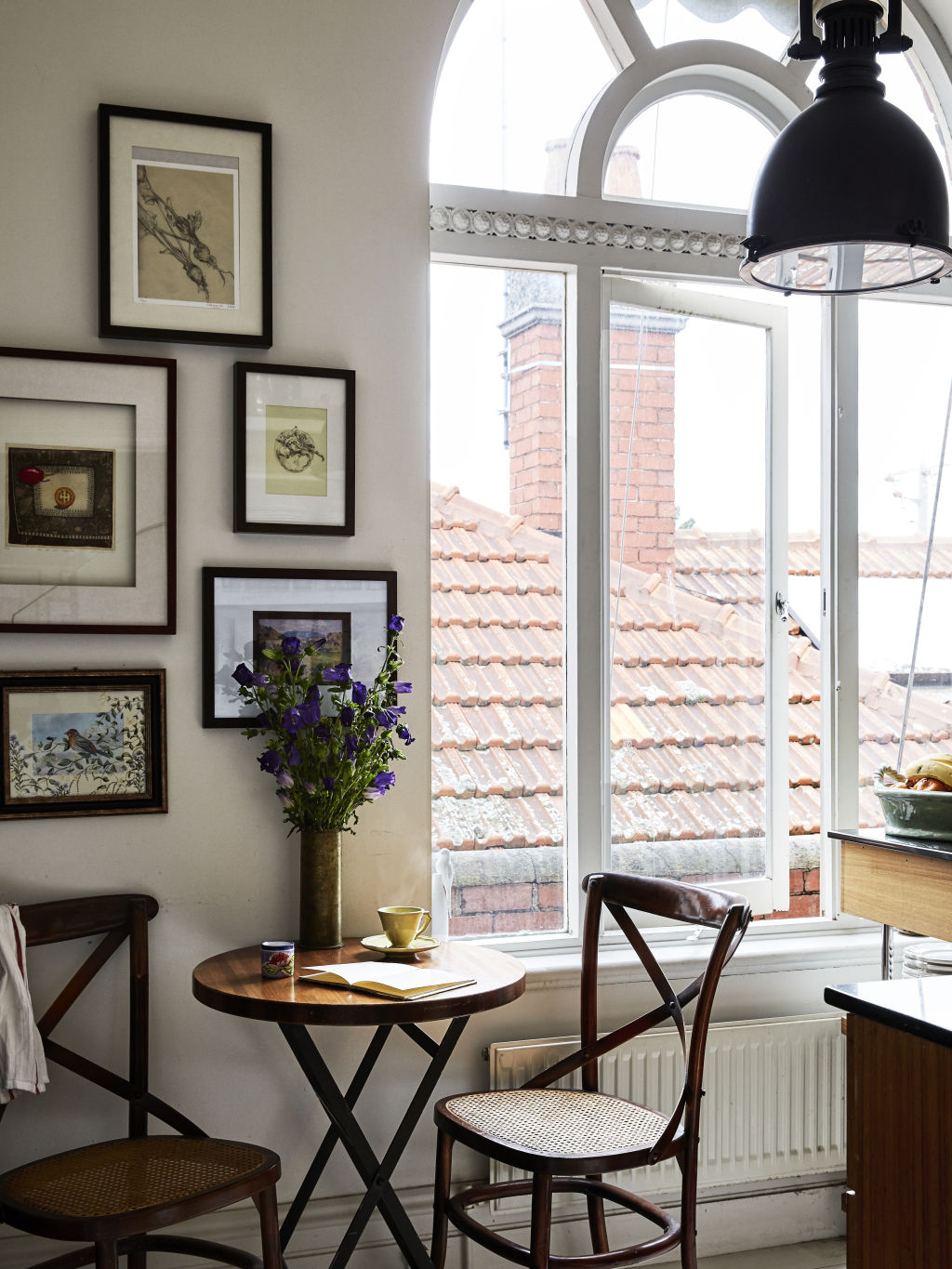 A sunny corner of the kitchen. Yoke pendant from Visual Comfort. Styling: Annie Portelli. Photo: Caitlin Mills