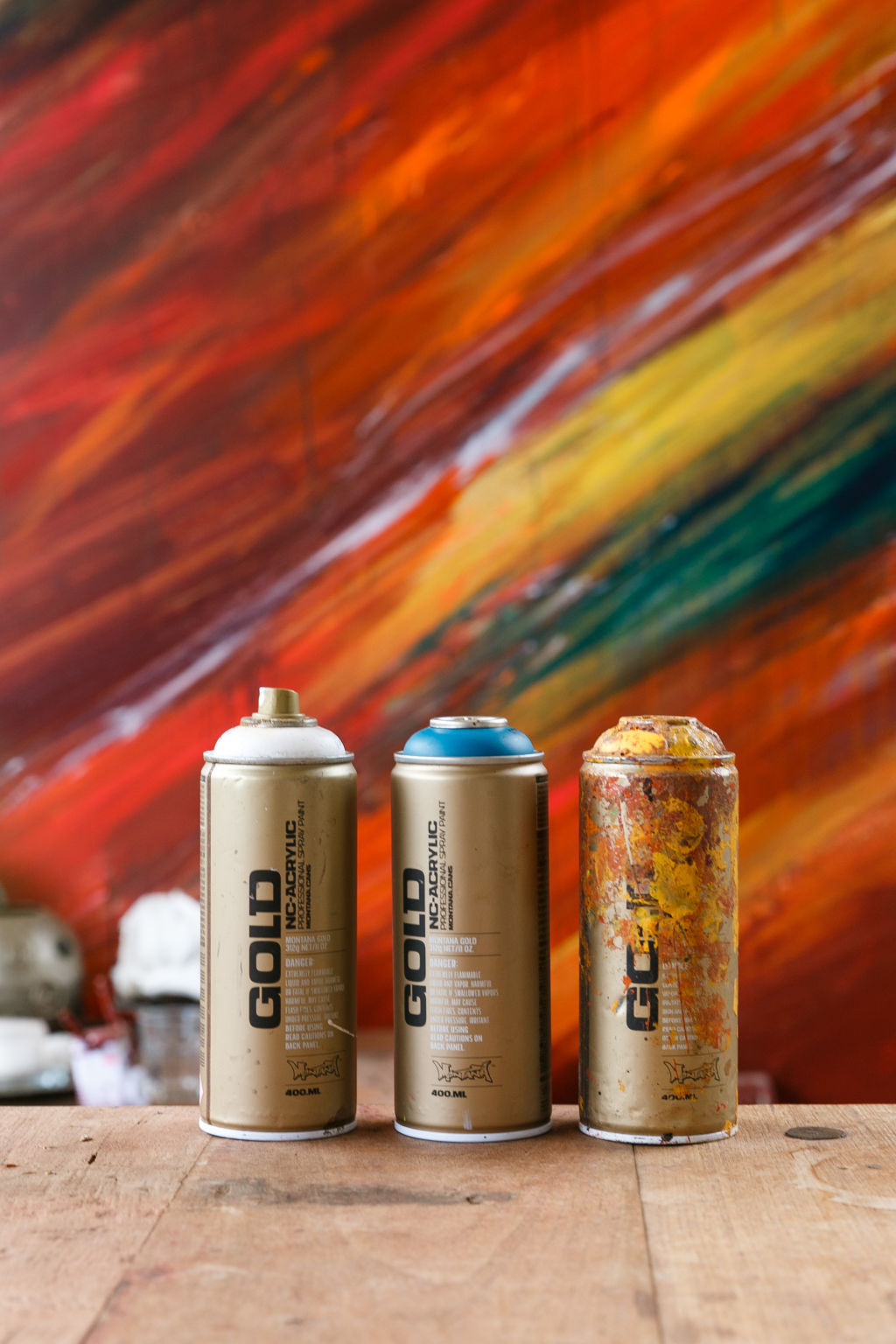 Adnate's collection of spray cans. Photo: Parker Blain.